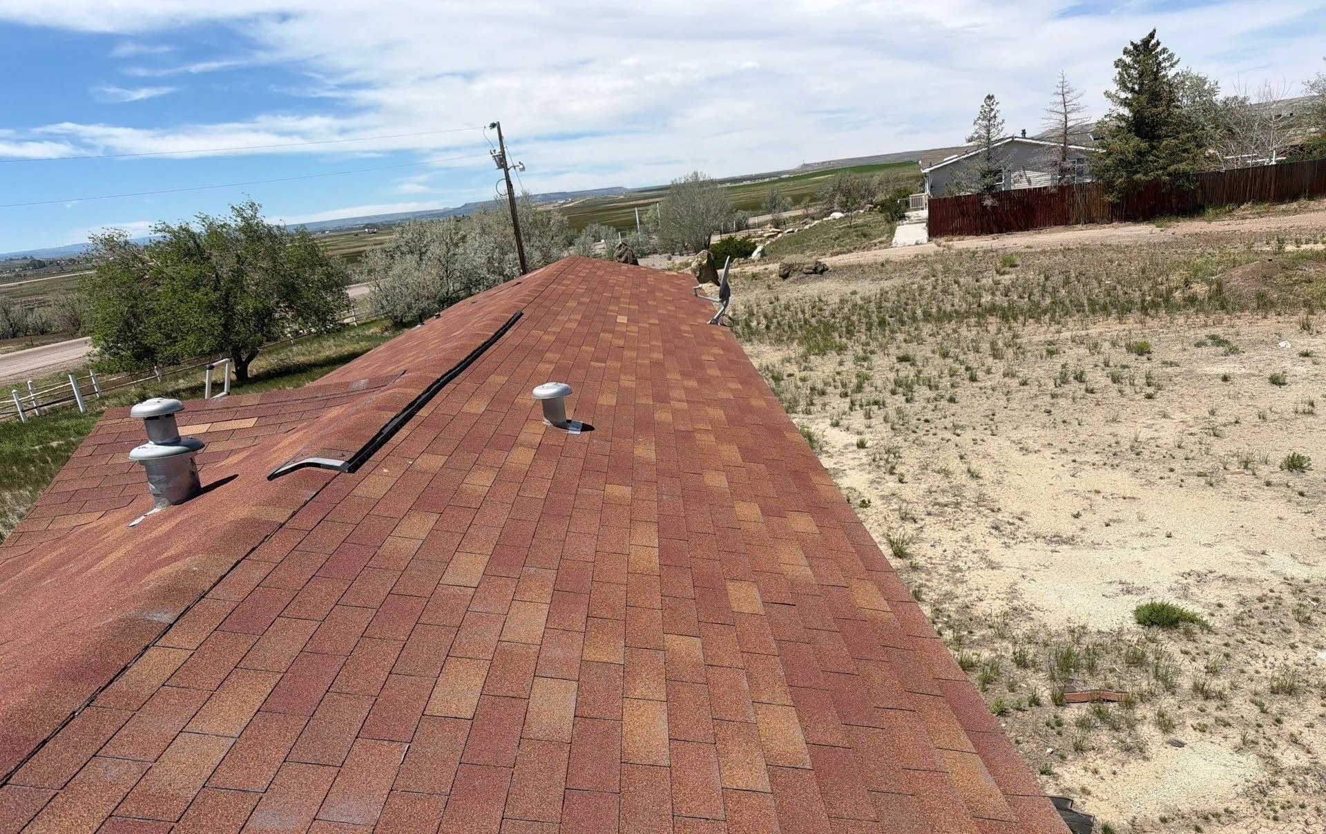 A shingle roof Gregco completed across the open Wyoming high desert